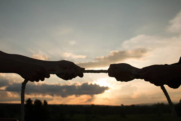 Pull the ropes, business competition Silhouette.