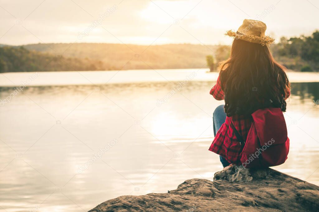 Female tourists in beautiful nature in tranquil scene in holiday.