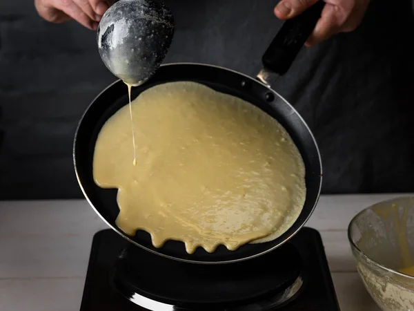 Man Cooking Homemade Crepes Pouring Dough Frying Pan — Stock Photo, Image