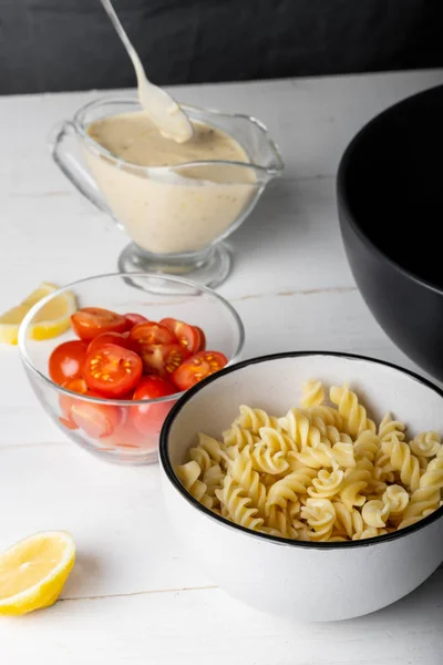 Close View Ingredients Warm Pasta Salad White Wooden Table — Free Stock Photo