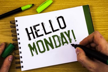 Merhaba Pazartesi motivasyonel ara gösterilen Not yazma. Olumlu bir mesaj yeni bir gün için hafta başlamak showcasing iş fotoğraf
