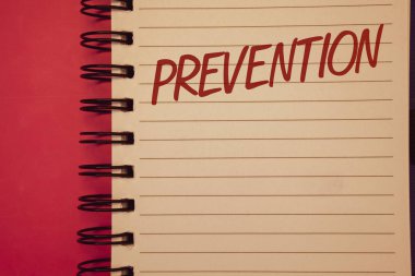 Önleme gösterilen Not yazma. Defter siyah harflerle kırmızı zemin üzerine oluşturulan olay sağlık Protectionideas fikir iletilerden bir şey durdurma vitrine iş fotoğraf