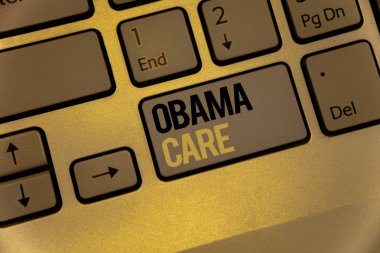 Obama bakım gösterilen metin işareti. Kavramsal fotoğraf hükümet programı, sigorta sistemi hasta Protectionkeyboard kahverengi anahtarları siyah sarı harfler niyeti metinler bilgisayarda oluşturun.