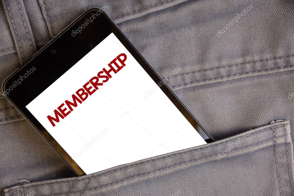 Handwriting texts writing Membership. Concept meaning Being member Part of a group or team Join an organizationConcept on cell phone into jean pocket white screen black and red letters