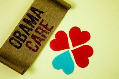 Obama bakım gösterilen Not yazma. Hükümet programı, sigorta sistemi hasta koruma vitrine iş fotoğraf