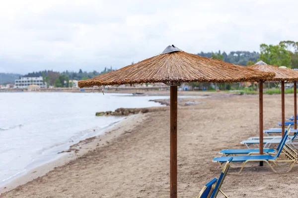 Bonita Umbrella Piling Beach Portable Lazy Chairs Diplay Hut Facing — Stock Photo, Image