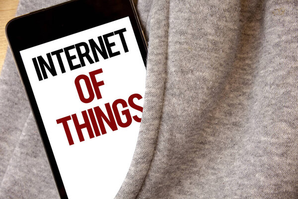 Handwriting text writing Internet Of Things. Concept meaning Innovation Globalization Digital Electronics Connectivity Hoar frost color side pocket cell phone be visible black and red letters