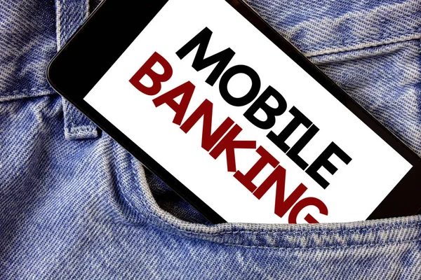 Word writing text Mobile Banking. Business concept for Online Money Payments and Transactions Virtual Bank Text two Words written black Phone white Screen front pocket blue jeans