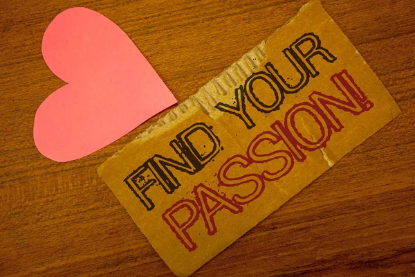Text sign showing Find Your Passion Motivational Call. Conceptual photo encourage people find their dream Peru color torn page with engraved black red text woody desk pink heart