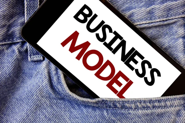 Word writing text Business Model. Business concept for Innovative Strategic Plan Marketing Vision Successful Ideas Text two Words written black Phone white Screen front pocket blue jeans