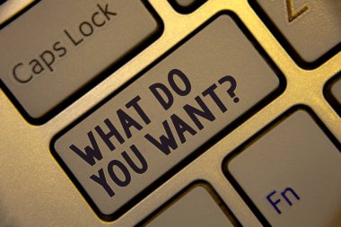 Handwriting text writing What Do You Want Question. Concept meaning Aspiration Contemplation Need Contemplate Aspire Golden keyboard with jet gray button presents black words and capslock key clipart