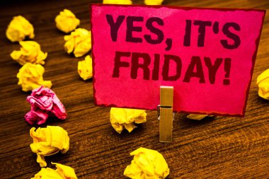 Conceptual hand writing showing Yes, It'S Friday Motivational Call. Business photo showcasing having weekend Taking rest break Paperclip retrain pink card with letters wooden floor hunch clipart