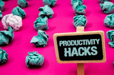 Text sign showing Productivity Hacks. Conceptual photo Hacking Solution Method Tips Efficiency Productivity Blackboard with white letter pink base much green paper lobs big white lob clipart