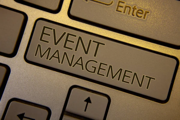 Word writing text Event Management. Business concept for Special Occasion Schedule Organization Arrange Activities Keyboard brown key black letters words Intention create text on computer