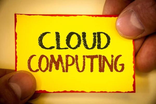 Writing note showing  Cloud Computing. Business photo showcasing Online Information Storage Virtual Media Data Server Text Words yellow paper red border fingers holding corner messsage