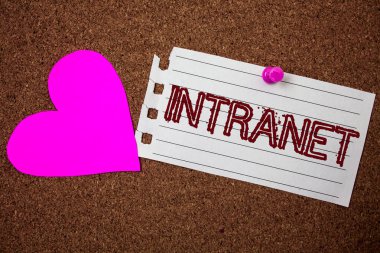 Handwriting text Intranet. Concept meaning Private network of a company Interlinked local area networks Piece notebook paper grunge ideas pink heart cork background love lovely clipart