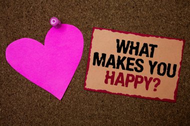 Kavramsal el ne yapar sen mutlu soru gösterilen yazma. Sevgi ve pozitif yaşam kahverengi halı fikirler mesaj pembe kalp aşk duyguları düşünceleri ile iş fotoğraf vitrine mutluluk gelir