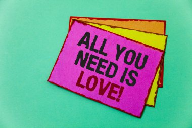 Writing note showing  All You Need Is Love Motivational. Business photo showcasing Deep affection needs appreciation romance Ideas message communicate feelings thought reflection green background