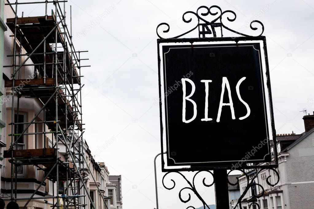 Word writing text Bias. Business concept for Unfair Subjective One-sidedness Preconception Inequality Bigotry Vintage black board sky old city vintage antique ideas message scaffolding