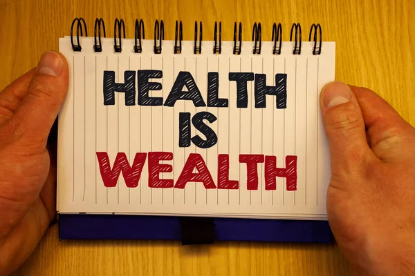 Word writing text Health Is Wealth. Business concept for being in good shape great value Stay healthy eat Healthy Papers Ideas messages important remember information wooden notepad