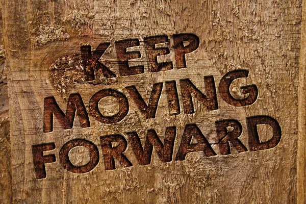 Word writing text Keep Moving Forward. Business concept for improvement Career encouraging Go ahead be better Message banner wood information board post plywood natural brown art