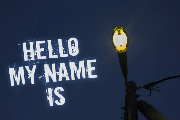 Word writing text Hello My Name Is. Business concept for Introduce yourself meeting someone new Presentation Light post dark blue cloudy clouds sky ideas message enlighten reflections