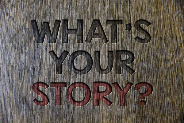 Writing note showing  What\'S Your Story Question. Business photo showcasing asking someone to tell me about himself Wooden wood background black engraved letters ideas messages concepts