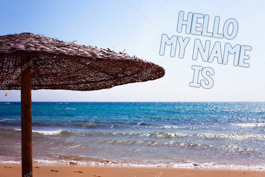Writing note showing  Hello My Name Is. Business photo showcasing Introduce yourself meeting someone new Presentation Blue beach sand message idea sunshade water sky natural landscape