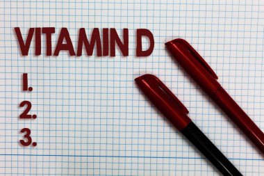 Sunbeam pozlama ve belirli yağda çözünen vitaminlerinin grafik kağıdına fikirleri önemli marker kalem pratik kitap işleri faydaları vitrine kavramsal el yazma gösteren Vitamin D. iş fotoğraf