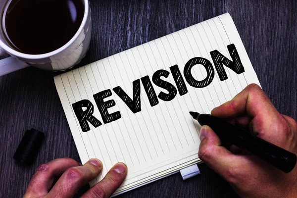 Text sign showing Revision. Conceptual photo Rechecking Before Proceeding Self Improvement Preparation Black coffee white cup paper marker pen thoughts creative black wood