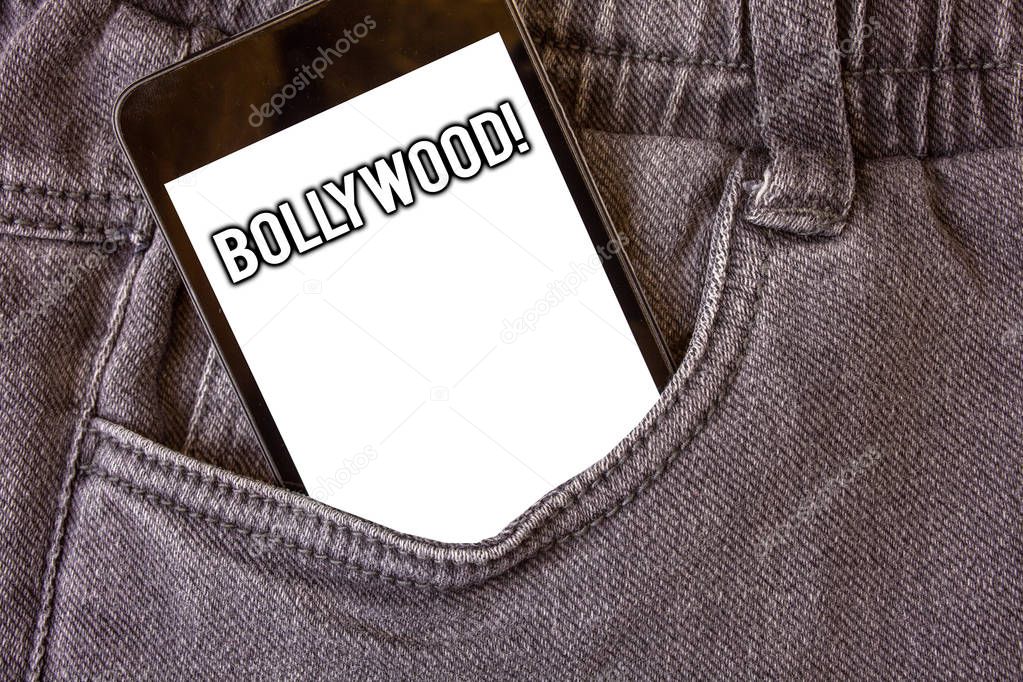 Word writing text Bollywood Motivational Call. Business concept for Hollywood Movie Film Entertainment Cinema Cell phone jean pocket white screen message communicate applications