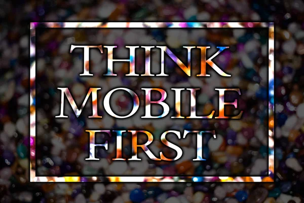 Text sign showing Think Mobile First. Conceptual photo Handheld devises marketing target portable phones first View card messages ideas love lovely memories temple dark colourful