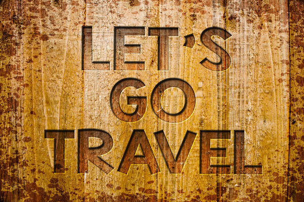 Conceptual hand writing showing Let'S Go Travel. Business photo showcasing Going away Travelling Asking someone to go outside Trip Wooden background wood colour beautiful templates message