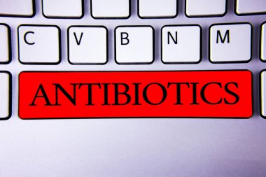El yazısı metin yazma antibiyotik. Antibakteriyel ilaç dezenfektan aseptik sterilize sıhhi klavye anlam kavramı kırmızı tuşa niyet oluşturma oluşturma fikir iletişim kağıt mesaj