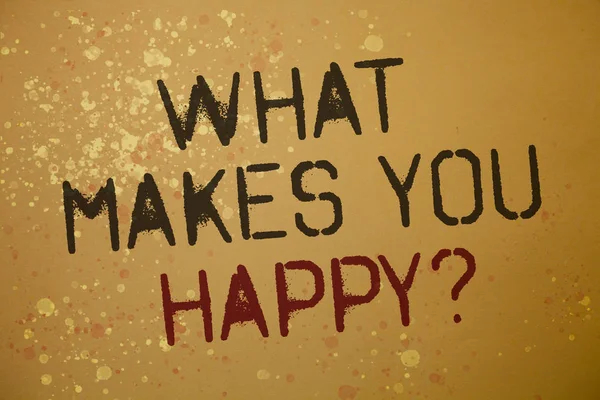 Word writing text What Makes You Happy Question. Business concept for Happiness comes with love and positive life Ideas messages brown background splatters grunge intentions reflections