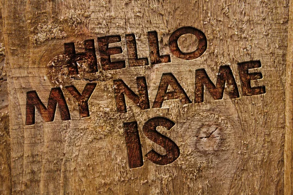 Word writing text Hello My Name Is. Business concept for Introduce yourself meeting someone new Presentation Message banner wood information board post plywood natural brown art