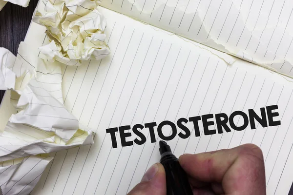 Conceptual hand writing showing Testosterone. Business photo showcasing Male hormones development and stimulation sports substance Paper object notepad crumpled papers ideas several tries