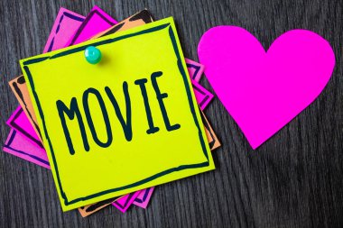 Film yazma el yazısı metin. Kavram sinema ya da televizyon film sinema Video göstermek üstünde perde sınır yapışkan anlam hatırlıyorum kartları aşk tutturulmuş kalp koyu odunsu arka plan