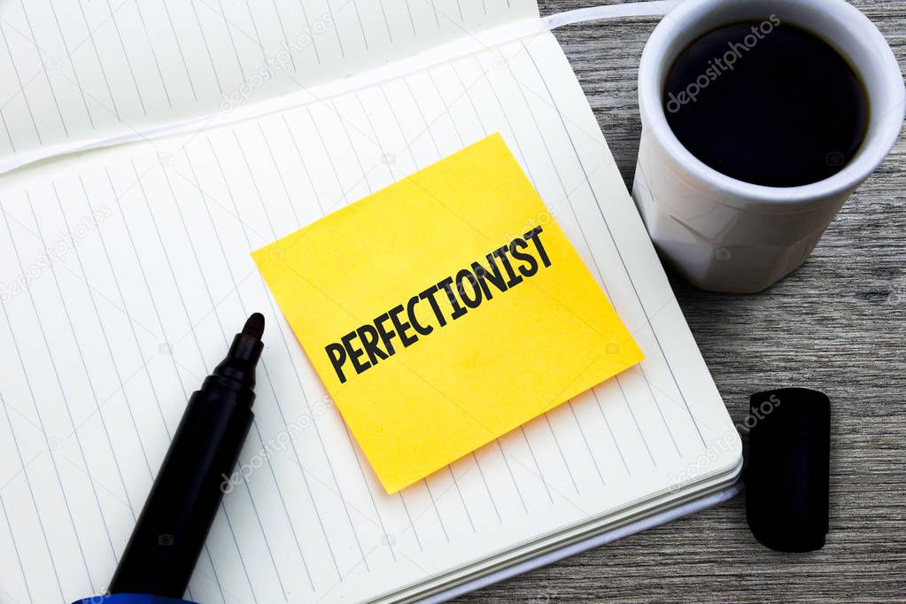 Handwriting text Perfectionist. Concept meaning Person who wants everything to be perfect Highest standards Study material folder card register notebook pen cap tea coffee cup table