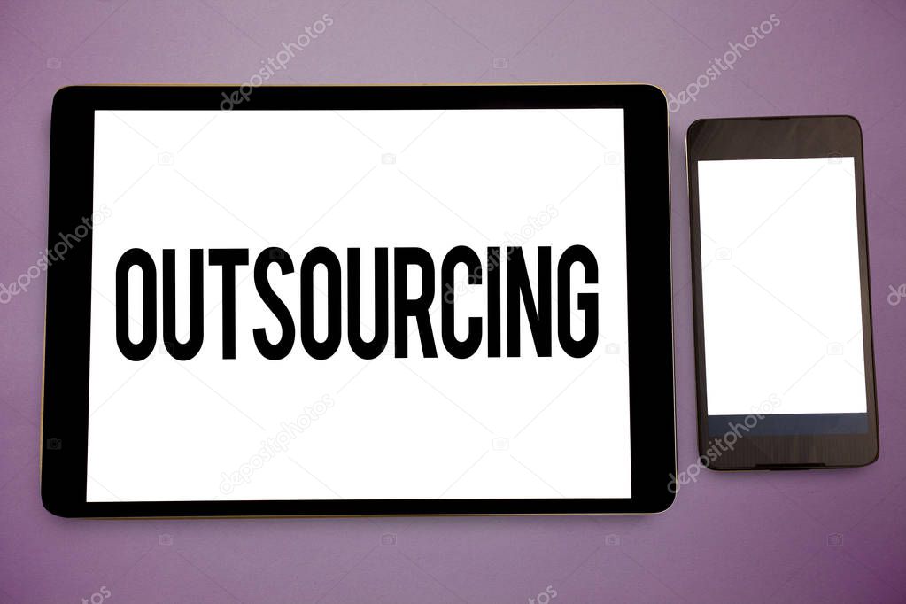 Writing note showing Outsourcing. Business photo showcasing Obtain goods or service by contract from an outside supplier Wide framed white smart screen tablet text messages communicate idea
