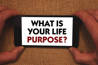 Ne Your Life amaç soru gösterilen Not yazma. Kişisel amaçları elde etmek hedef cep telefonu beyaz ekran mesaj app hasır arka planda tutan adam belirlenmesi vitrine iş fotoğraf