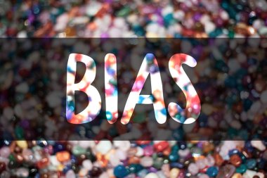 Text sign showing Bias. Conceptual photo Unfair Subjective One-sidedness Preconception Inequality Bigotry Blurry candies candy ideas message reflection sweets thoughts communicate clipart