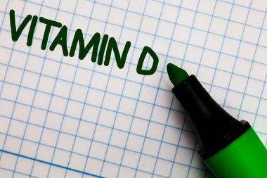 Sunbeam pozlama ve belirli yağda çözünen vitaminlerinin grafik kağıdı marker kalem fikirler vitrine Vitamin D. iş fotoğraf gösterilen Not yazma teorileri pratik önemli beyaz iş