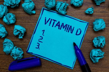 El yazısı metin Vitamin D. sunbeam pozlama ve belirli yağda çözünen vitaminlerinin faydaları Camgöbeği kağıt hayal fikir düşünce anlam kavramı birkaç güvenilir marker kalem hataları