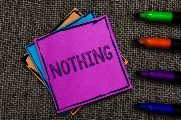 Text sign showing Nothing. Conceptual photo Not anything No single thing or value Absence of progress Blank Multiple colour sticky remember cards pen script marker jute background