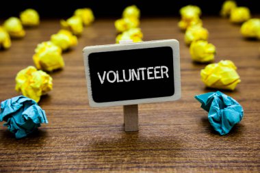 Kavramsal el gönüllü gösterilen yazma. İş fotoğraf vitrine gönüllülük birey için daha fazla sosyal neden diğer yaratıcı fikir kağıt nesne ilham birkaç deneme hizmet