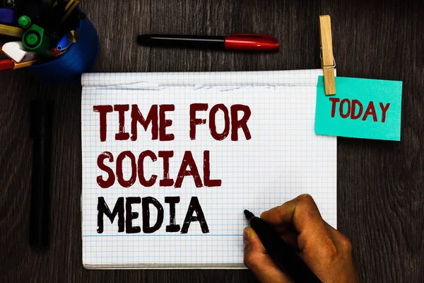 Conceptual hand writing showing Time For Social Media. Business photo text meeting new friends discussing topics news and movies Register pages handwriting text work stationery items woody table
