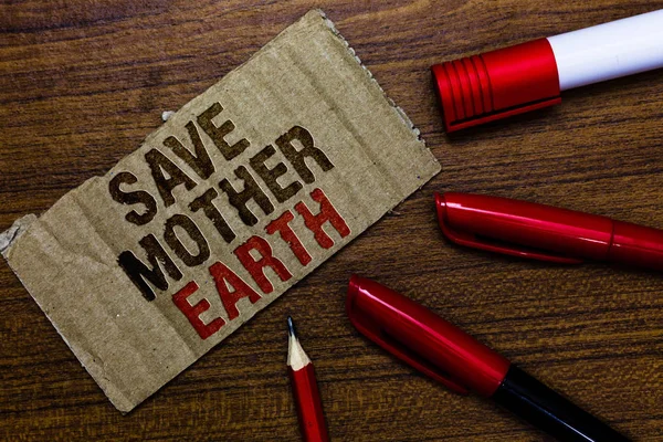 Word writing text Save Mother Earth. Business concept for doing small actions prevent wasting water heat energy Pen pencil cap board marker pointer text cardboard notice script idea