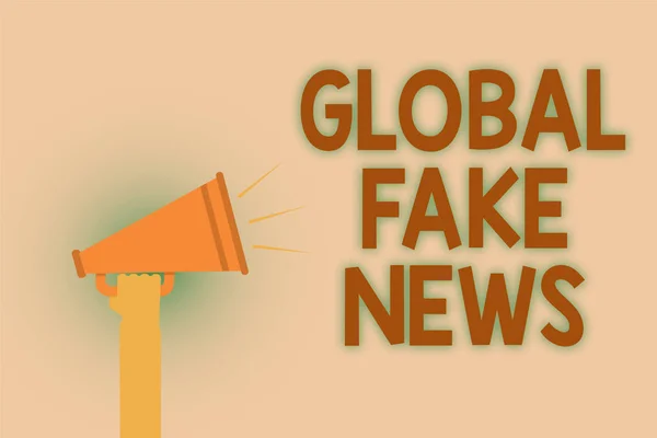 Word writing text Global Fake News. Business concept for False information Journalism Lies Disinformation Hoax Hand brown loud speaker sound public message hot issue announcement