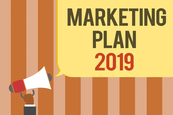 Writing note showing Marketing Plan 2019. Business photo showcasing schedule defining brand selling way in next year Multiline text board typing make announcement declare messages idea